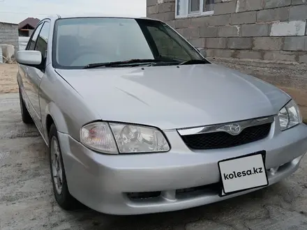 Mazda Familia 1998 года за 800 000 тг. в Шымкент – фото 3