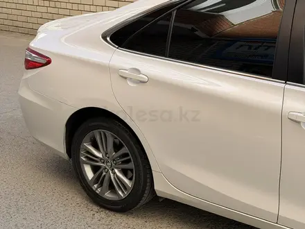 Toyota Camry 2016 года за 6 900 000 тг. в Атырау – фото 28