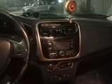 Renault Logan 2014 года за 2 300 000 тг. в Атырау – фото 3