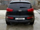 Kia Sportage 2014 года за 8 100 000 тг. в Атырау – фото 2