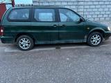 Kia Carnival 1999 года за 900 000 тг. в Абай (Келесский р-н) – фото 2