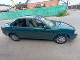 Mazda 323 1999 года за 900 000 тг. в Алматы – фото 2