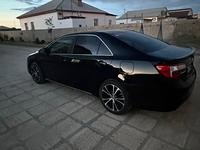 Toyota Camry 2013 года за 6 000 000 тг. в Жанаозен