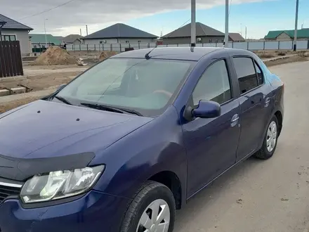 Renault Logan 2014 года за 1 900 000 тг. в Атырау – фото 3