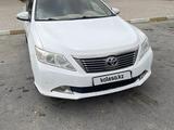 Toyota Camry 2012 годаfor9 500 000 тг. в Жанаозен