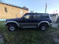 Nissan Patrol 1999 годаfor4 200 000 тг. в Караганда