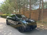 BMW X6 XDrive 40i 2025 года за 60 000 000 тг. в Астана