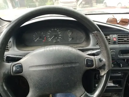 Mazda 323 1995 года за 600 000 тг. в Актобе – фото 6