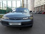 Mazda 626 1994 года за 900 000 тг. в Астана – фото 2