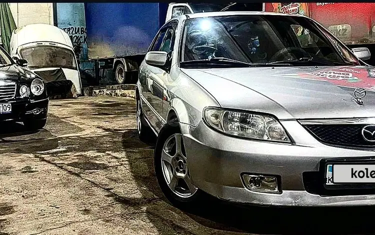 Mazda 323 2002 годаfor2 500 000 тг. в Караганда