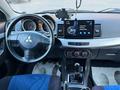 Mitsubishi Lancer 2010 года за 2 700 000 тг. в Астана – фото 7