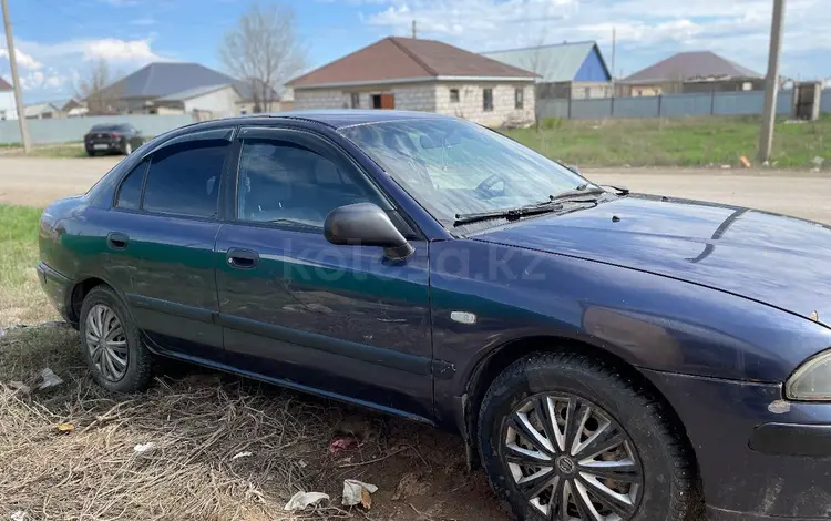 Mitsubishi Carisma 2001 годаүшін1 500 000 тг. в Уральск