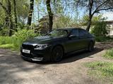 BMW M5 2013 года за 26 000 000 тг. в Алматы – фото 2