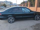Mazda 626 1998 года за 1 100 000 тг. в Астана – фото 4