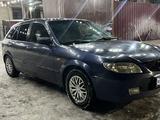 Mazda 323 2001 годаүшін1 950 000 тг. в Алматы – фото 2