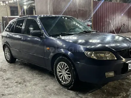 Mazda 323 2001 года за 1 950 000 тг. в Алматы – фото 2