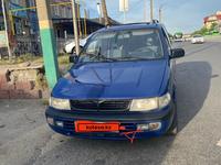 Mitsubishi Space Runner 1996 годаүшін1 500 000 тг. в Шымкент