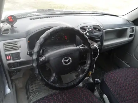 Mazda Demio 2002 года за 800 000 тг. в Актау – фото 9