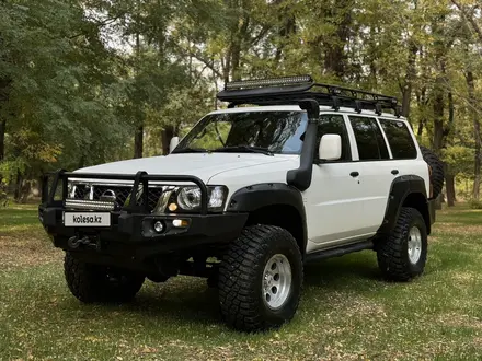 Nissan Patrol 2009 года за 21 000 000 тг. в Алматы – фото 3