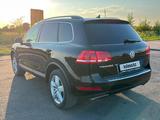 Volkswagen Touareg 2012 года за 9 999 999 тг. в Астана – фото 4