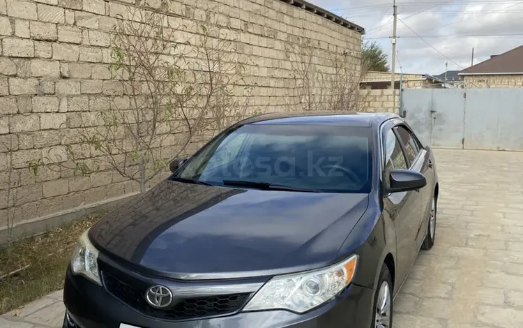 Toyota Camry 2014 года за 8 500 000 тг. в Жанаозен