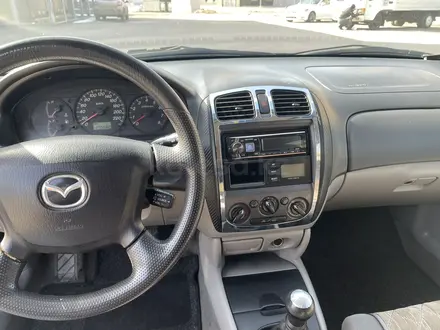 Mazda 323 2001 года за 1 600 000 тг. в Астана – фото 4
