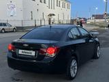 Chevrolet Cruze 2012 года за 2 600 000 тг. в Уральск – фото 3