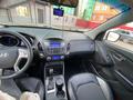 Hyundai Tucson 2013 года за 9 500 000 тг. в Актобе – фото 23