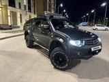 Mitsubishi L200 2012 годаүшін6 500 000 тг. в Караганда