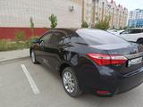 Toyota Corolla 2015 года за 6 250 000 тг. в Актобе – фото 2