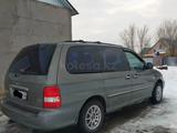 Kia Carnival 2005 года за 4 500 000 тг. в Актобе – фото 4