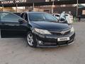 Toyota Camry 2013 годаfor9 300 000 тг. в Шымкент