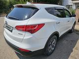 Hyundai Santa Fe 2015 годаfor9 700 000 тг. в Алматы – фото 3