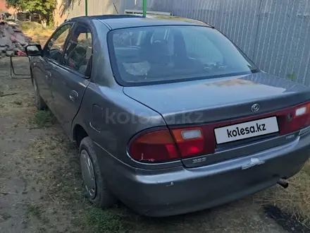 Mazda 323 1995 года за 900 000 тг. в Алматы – фото 4