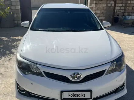Toyota Camry 2014 года за 5 200 000 тг. в Жанаозен