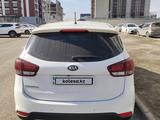 Kia Carens 2021 года за 7 500 000 тг. в Астана – фото 2