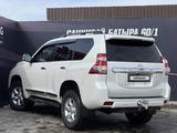 Toyota Land Cruiser Prado 2013 года за 15 190 000 тг. в Актобе – фото 3