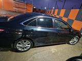 Toyota Camry 2015 года за 11 000 000 тг. в Атырау – фото 4