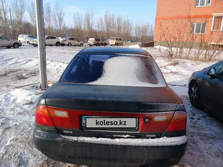 Mazda 323 1994 года за 790 000 тг. в Астана – фото 7