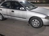 Mazda 323 1997 года за 950 000 тг. в Талдыкорган – фото 4