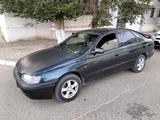 Toyota Carina E 1995 года за 1 650 000 тг. в Байконыр – фото 3