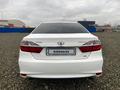 Toyota Camry 2014 года за 8 384 250 тг. в Астана – фото 2