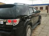 Toyota Fortuner 2014 года за 12 200 000 тг. в Жанаозен – фото 2