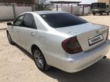 Toyota Camry 2004 года за 4 100 000 тг. в Жанаозен – фото 3