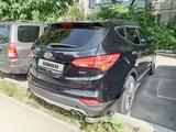 Hyundai Santa Fe 2014 года за 13 000 000 тг. в Алматы