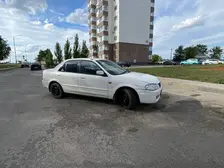 Mazda Familia, 1999
