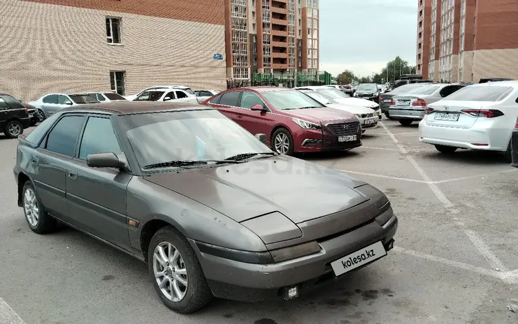 Mazda 323 1994 годаfor1 400 000 тг. в Астана