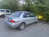 Mitsubishi Lancer 2005 года за 1 000 000 тг. в Астана – фото 2