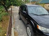 Mitsubishi Outlander 2009 года за 4 800 000 тг. в Шымкент – фото 4