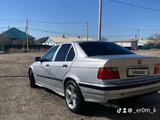 BMW 320 1991 года за 900 000 тг. в Айтеке би – фото 3